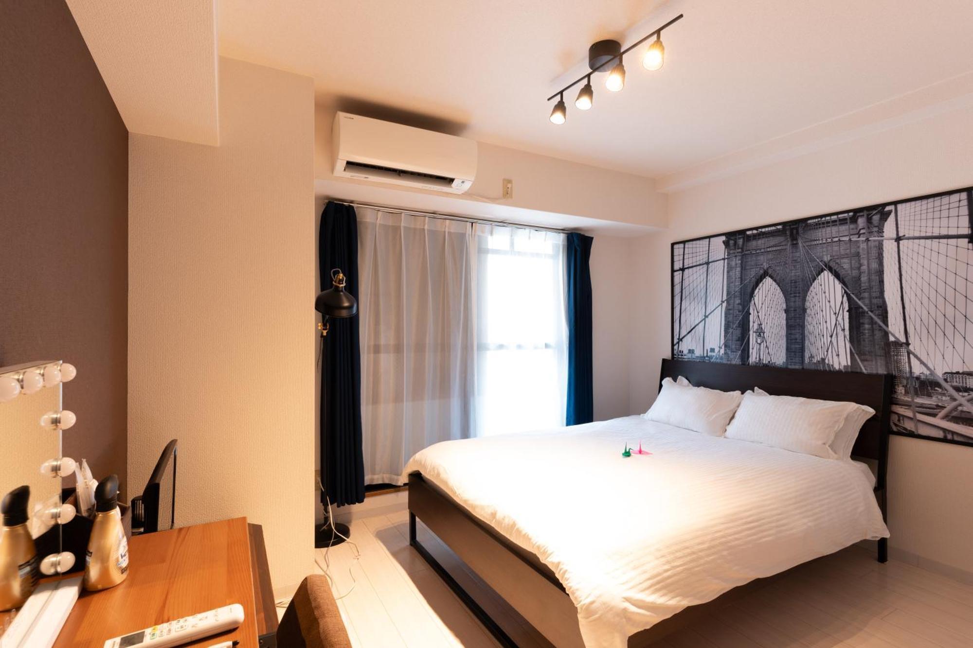 コンフィデンスロン201 Appartement Osaka Buitenkant foto