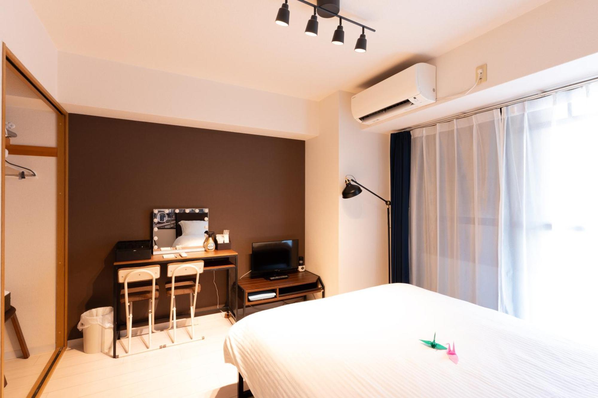 コンフィデンスロン201 Appartement Osaka Buitenkant foto